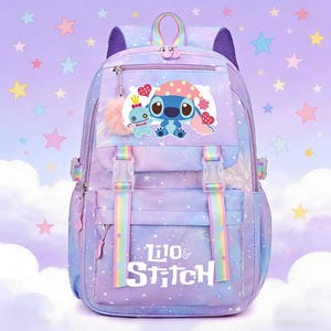 May include: A purple and blue backpack featuring the characters Stitch and Angel from Lilo & Stitch. The backpack has rainbow straps, a fluffy pink pom-pom, and the words "Lilo & Stitch" printed on the front. The background is a starry sky.