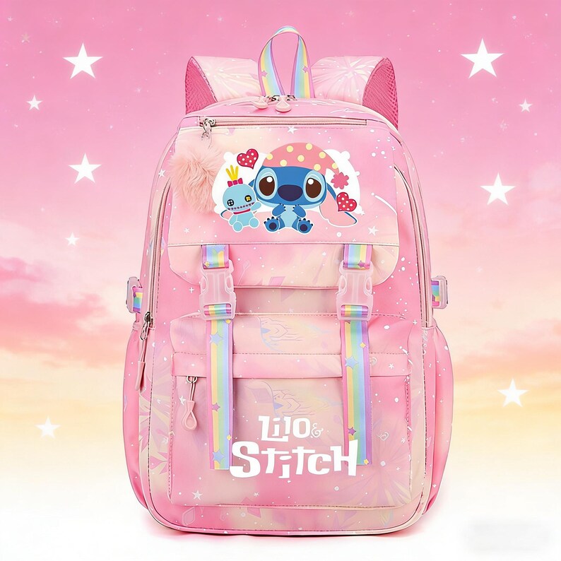 May include: Pink backpack featuring a cartoon image of Stitch and the words "Lilo & Stitch". The backpack has rainbow-colored straps and a fluffy pink pom-pom. It has multiple compartments and adjustable straps.