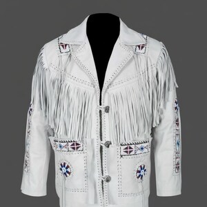 May include: White leather jacket with fringe and decorative beading. The jacket has long fringe on the sleeves and chest, with blue, red, and white beaded patterns. Silver-tone buttons and decorative stitching complete the design.