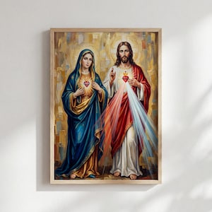 Könnte beinhalten: Ein gerahmter religiöser Druck mit zwei Figuren, eine in einem blauen Gewand und die andere in einem roten Gewand, jede mit einem leuchtenden Herzen. Der Hintergrund ist goldfarben, und das Kunstwerk befindet sich in einem Holzrahmen.