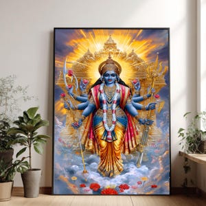 Op de afbeelding: Ingelijste print van een veelarmige godheid met blauwe huid, versierd met gouden sieraden en een bloemenslinger. De figuur staat tegen een achtergrond van gouden architectuur en stralend licht, met een bewolkte lucht en rode bloemen aan de basis.