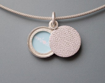 Minimalist modern locket for a small photo with textured sterling silver