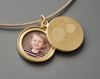 golden double locket with delicate dandelions