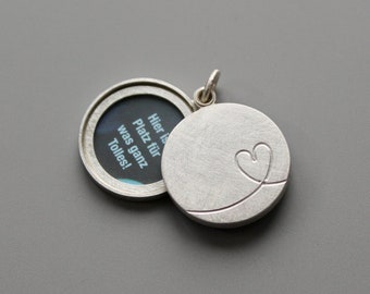 modern love locket for two photos in sterling silver with cute heart design