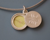 small sterling silver locket for two pictures - dainty flower double locket