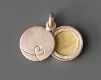 charming picture locket with a little heart in sterling silver