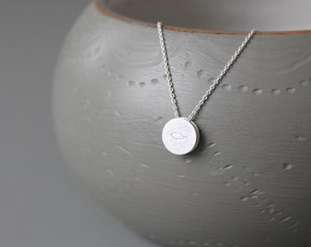 Minimalist pendant necklace in sterling silver with fish symbol