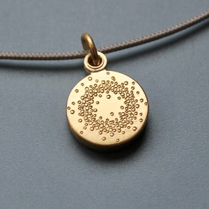 small golden locket for one picture with 1000 dots design image 2