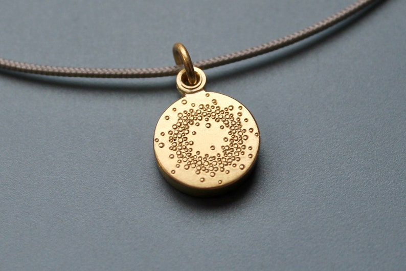 small golden locket for one picture with 1000 dots design image 2