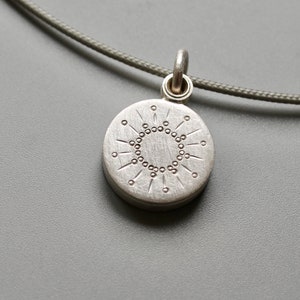 tiny silver picture locket with sun design image 4