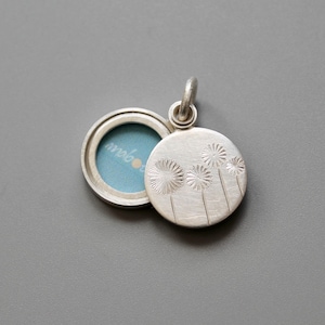 handmade round photo locket with delicate dandelions
