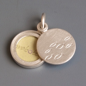 maritime silver locket for one photo with school of fish