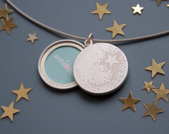 large locket for two photos in sterling silver with shooting star