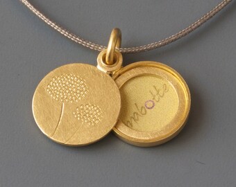 elegant golden picture locket with dandelions