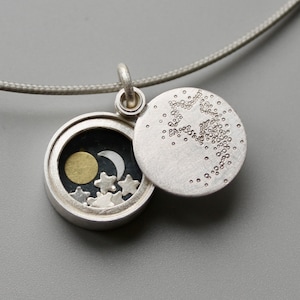 Small silver locket Sun Moon and Stars with shooting star locket image 1