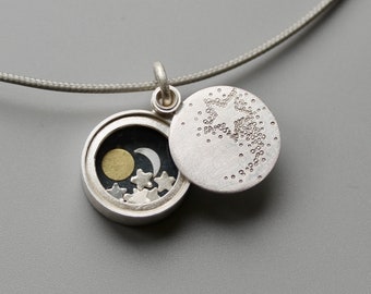 Small silver locket Sun Moon and Stars with shooting star locket