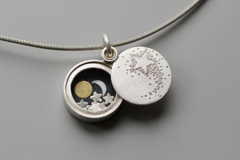 Small silver locket Sun Moon and Stars with shooting star locket image 1