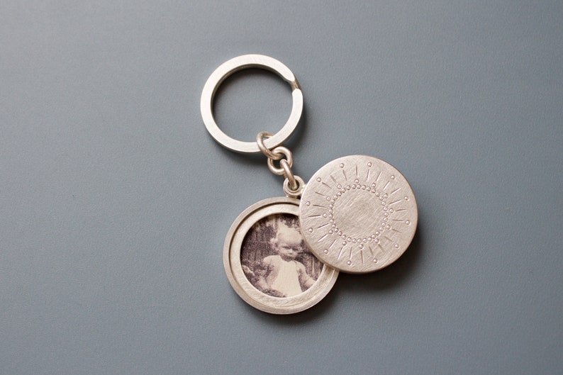 silver keychain locket for two pictures with sun decor image 3