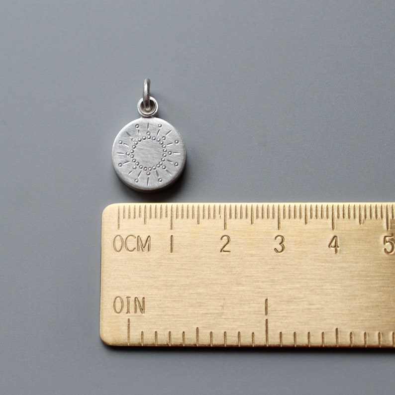 tiny silver picture locket with sun design image 6