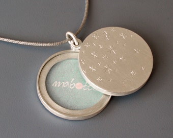 sterling silver locket for two pictures with stars