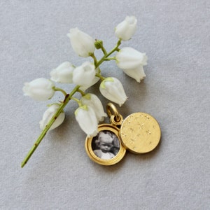 beautiful golden locket for two pictures with starry night design