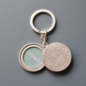 silver keychain locket for two pictures with sun decor image 4