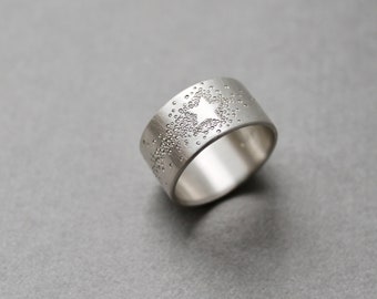 wide silver band ring with shooting star design