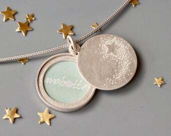 unique picture locket with a shooting star in sterling silver