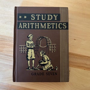 May include: A vintage brown hardcover book titled "Study Arithmetics" with gold lettering. The cover features illustrations of two children and the text "Grade Seven". The book has a classic, educational theme.