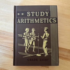 May include: Vintage brown "Study Arithmetics" book with gold lettering and illustrations. The cover features a drawing of three people and the text "Grade Eight". The book has vertical gold stripes on the right side.