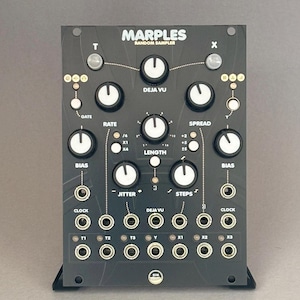 May include: Black electronic music synthesizer module with white knobs and the text "MARPLES RANDOM SAMPLER." Features include "RATE," "LENGTH," and "SPREAD" controls, along with various input/output jacks and indicator lights. The module is mounted on a black panel.