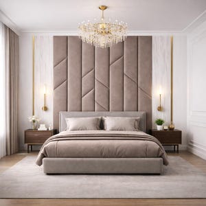 May include: A luxurious bedroom featuring a bed with a tufted headboard in a neutral color. The room is decorated with a crystal chandelier, bedside tables, and a soft rug. Gold accents and wall sconces add to the elegant design.