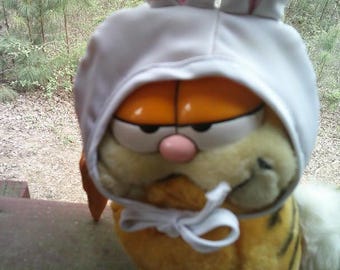 Cazador de conejos de Pascua Garfield con etiqueta