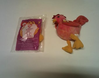 Luce el gorro de gallo con Teenie Beanie Baby.