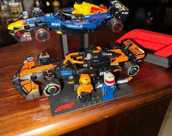 Dual lego speed champion f1 stand with mini figure pins