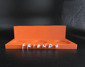 Mcdonalds friends toys display stand in orange.
