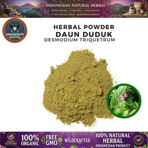 May include: A pile of olive-green herbal powder labeled as HERBAL POWDER DAUN DUDUK DESMODIUM TRIQUETRUM. The image includes a circular inset showing green leaves and small purple flowers, with text indicating the product is 100% organic and wild-crafted.