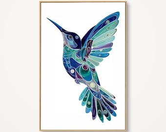 May include: A framed print featuring a stylized hummingbird in flight. The bird is rendered in shades of blue, teal, and purple, with intricate patterns and details. The artwork is set against a white background, and the frame is a light brown color.