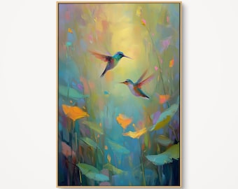 May include: A framed painting featuring two hummingbirds in flight amidst a colorful, impressionistic garden. The artwork uses a palette of blues, greens, yellows, and oranges, creating a vibrant and dynamic scene. The birds' wings are spread, suggesting movement.
