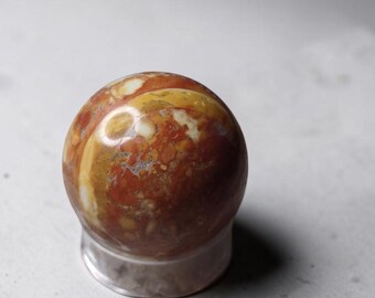 Gepolijste Maligano jaspisbol, natuurlijke Indonesische verzamelsteen (50,1 mm)