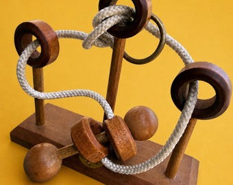 Rompecabezas de madera Vintage Stumps de 1979, juguetes de leñador, hecho en San Francisco, bolas de madera, anillo de latón, cuerdas, rompecabezas de exhibición Grandmacore