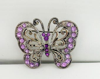 Vintage vlinderbroche zilverkleurig met paarse strassteentjes