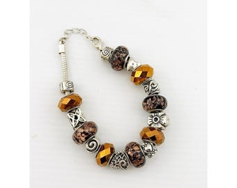 Y2K bronzen beauty bedelarmband 7 3/4 maat op laatste schakel