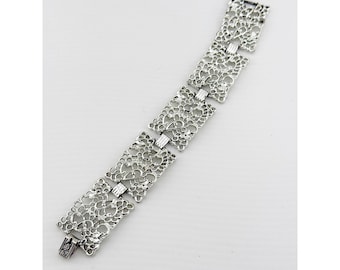 Vintage Emmons zilverkleurige filigraan schakelarmband. Collectie frosted kant