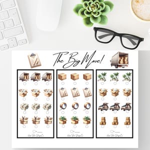 May include: A white paper with the text "The Big Move!" and moving-themed illustrations. The illustrations include moving trucks, boxes, tape, and plants. A clipboard is also shown.