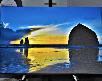 Haystack Rock at Cannon Beach is an Oregon icon. Beautiful sunset makes it that much prettier.