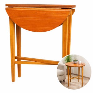 Puede incluir: Una mesa de madera con tapa abatible y un cálido acabado marrón rojizo. La mesa tiene una hoja semicircular que se puede plegar. Las patas son rectas y robustas. La mesa mide aproximadamente 76 cm de altura.