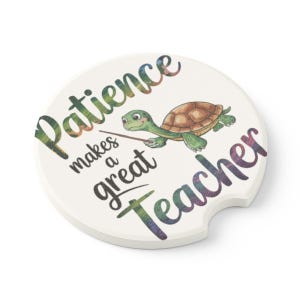 May include: A set of three ceramic mugs with a speckled, matte finish. The mugs are in shades of cream, light gray, and dark gray. Each mug has a simple, minimalist design and a rounded handle.