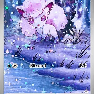 May include: A holographic Alolan Vulpix Pokémon card. The card features a light purple Vulpix with a fluffy tail and ears, set against a snowy, wintery background. The card includes the text "Blizzard" and "120".