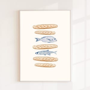May include: A framed print with a cream background, depicting a vertical stack of illustrations. It alternates between light brown baguettes and two types of blue fish. The artwork is a simple, yet elegant design.